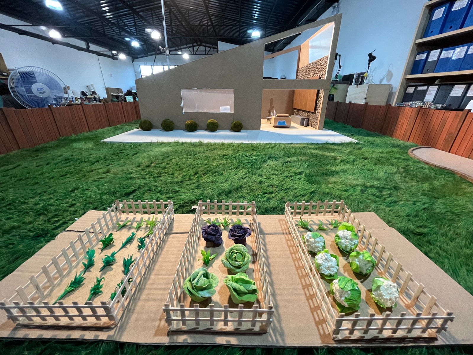 Miniature garden beds with handmade vegetables