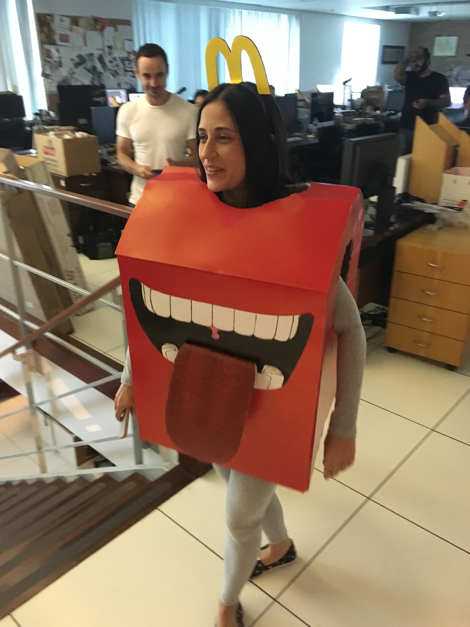 The handmade Happy Meal costume walking through the LOBO studio