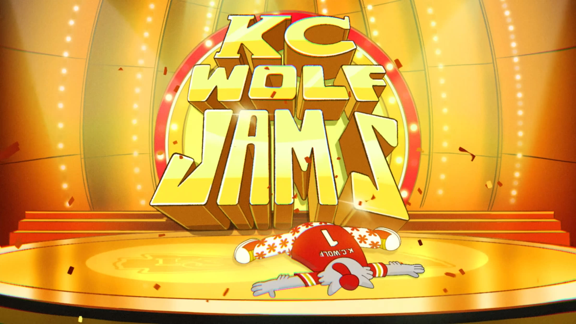 The KC Wolf Jamz title card on a gold stage, the Wolf face down in confetti