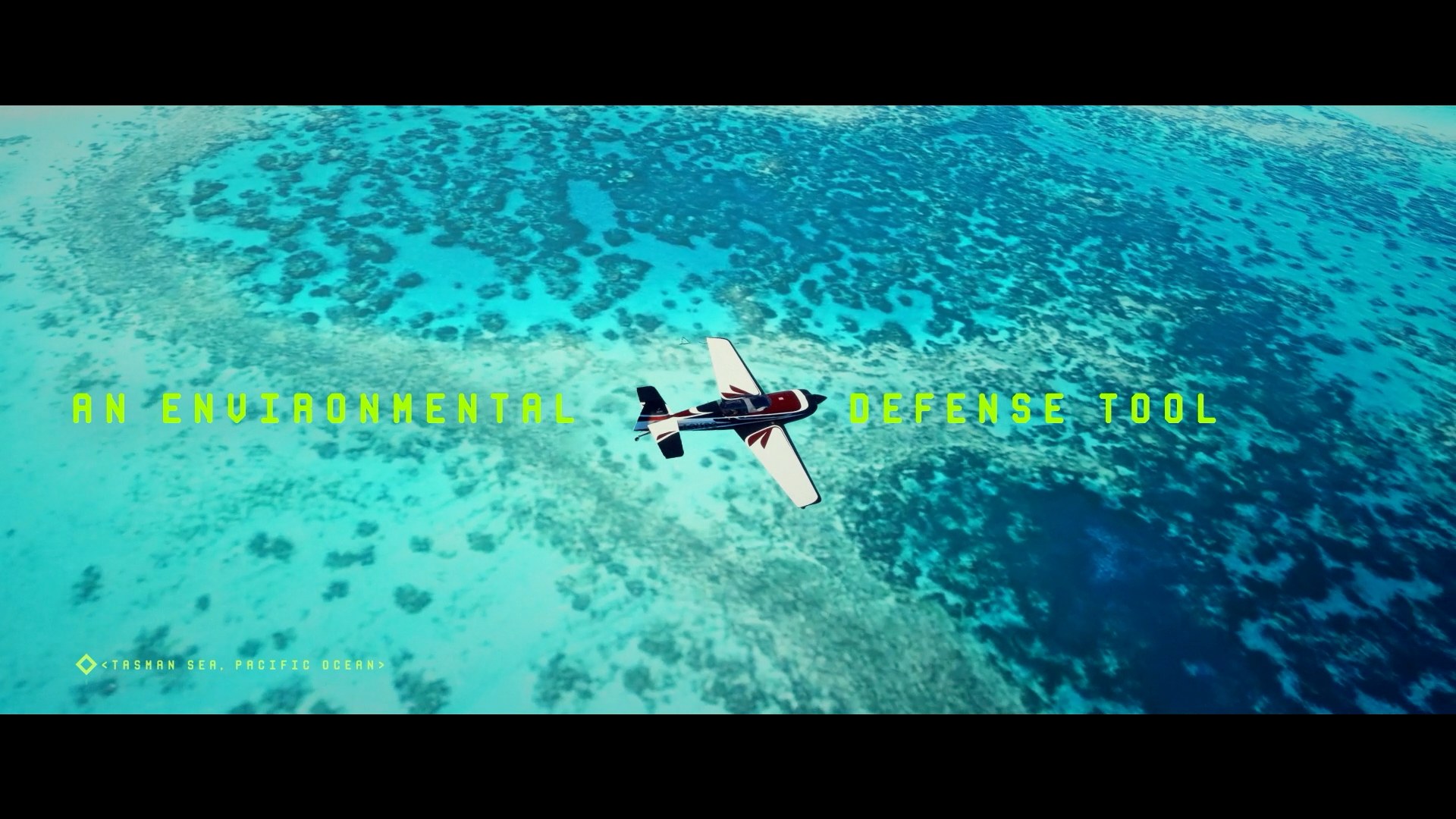 A light aircraft flying over a turquoise reef in a flight simulator