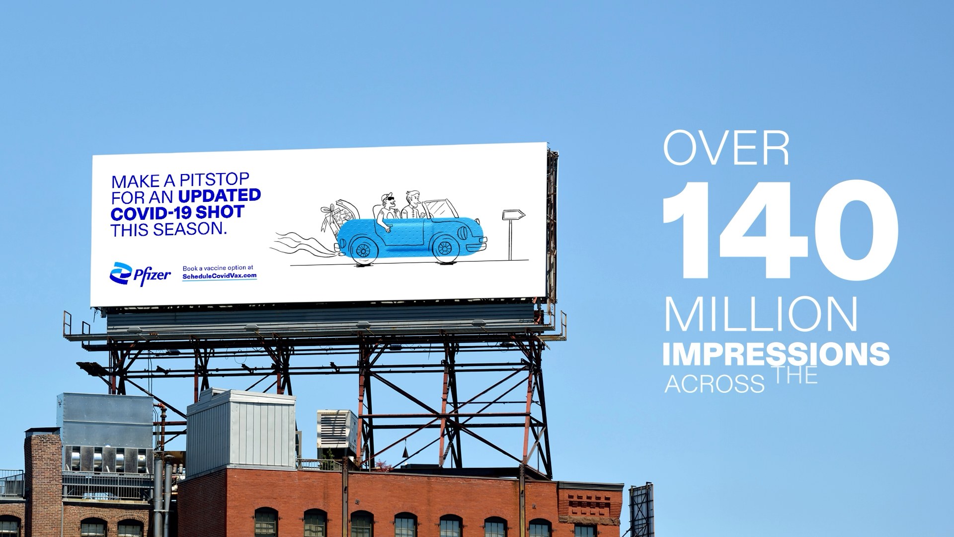 A roadside Pfizer billboard reading Make a pitstop for an updated COVID-19 shot this season