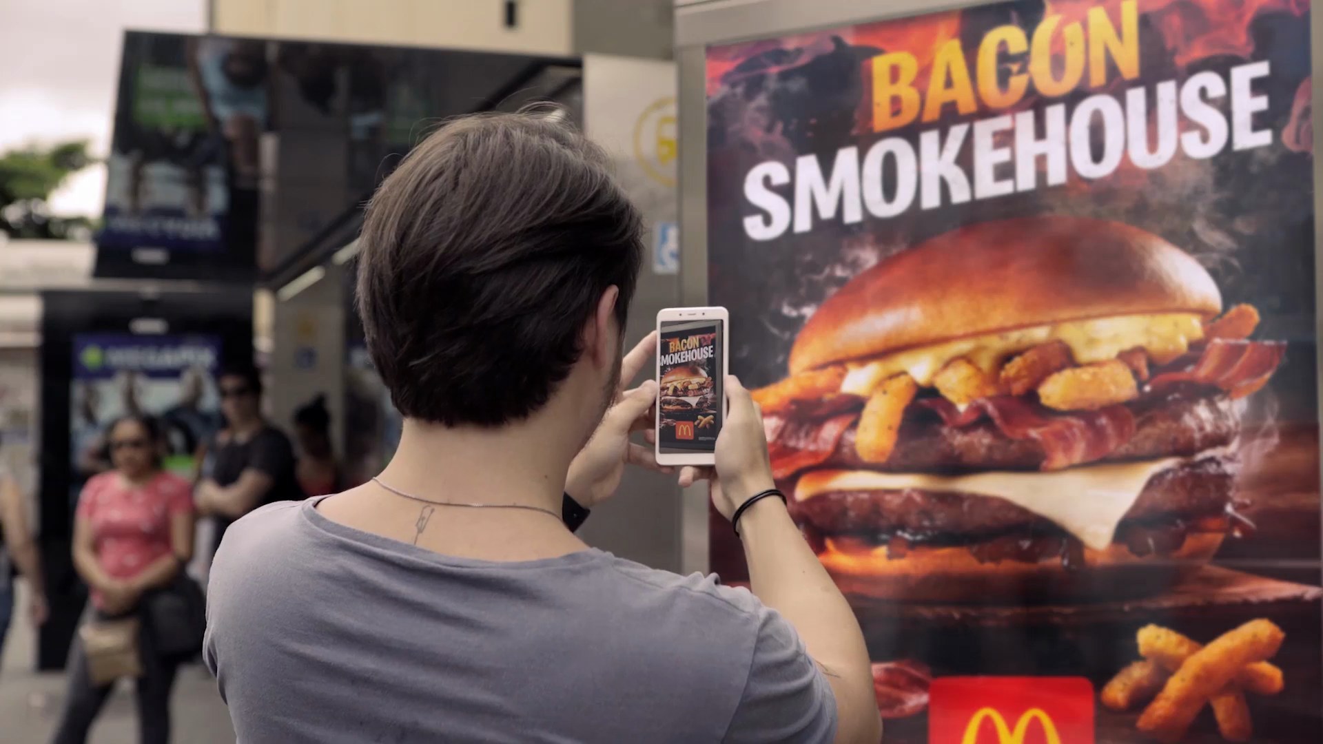 Burger King Burn That Ad, a phone burning a rival poster in augmented reality